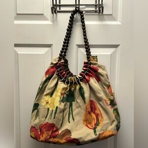 Colorful women’s fabric bag with wood accent straps